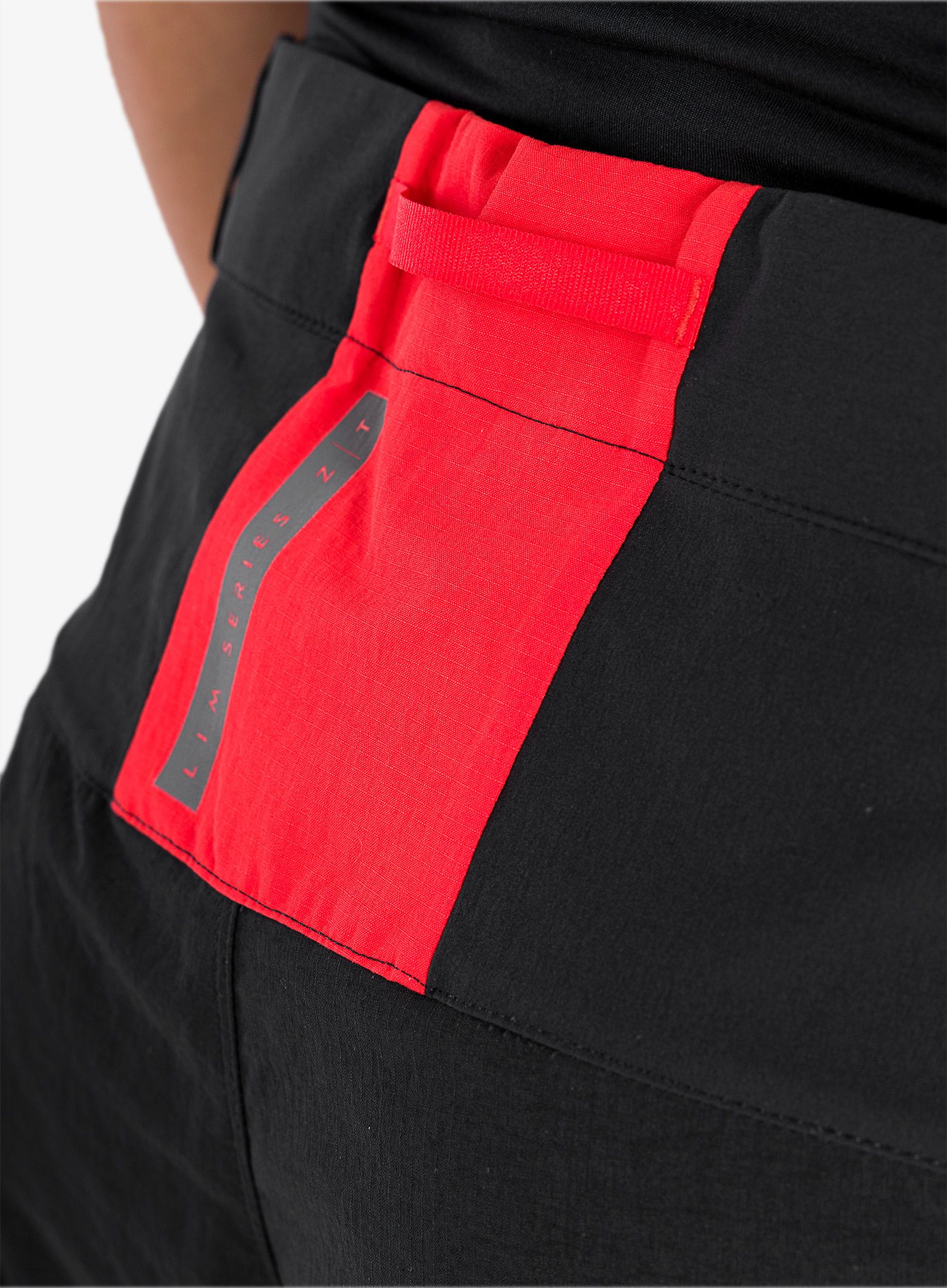 Trekové kalhoty pánské Haglofs L.I.M ZT Pant - true black/zenith red