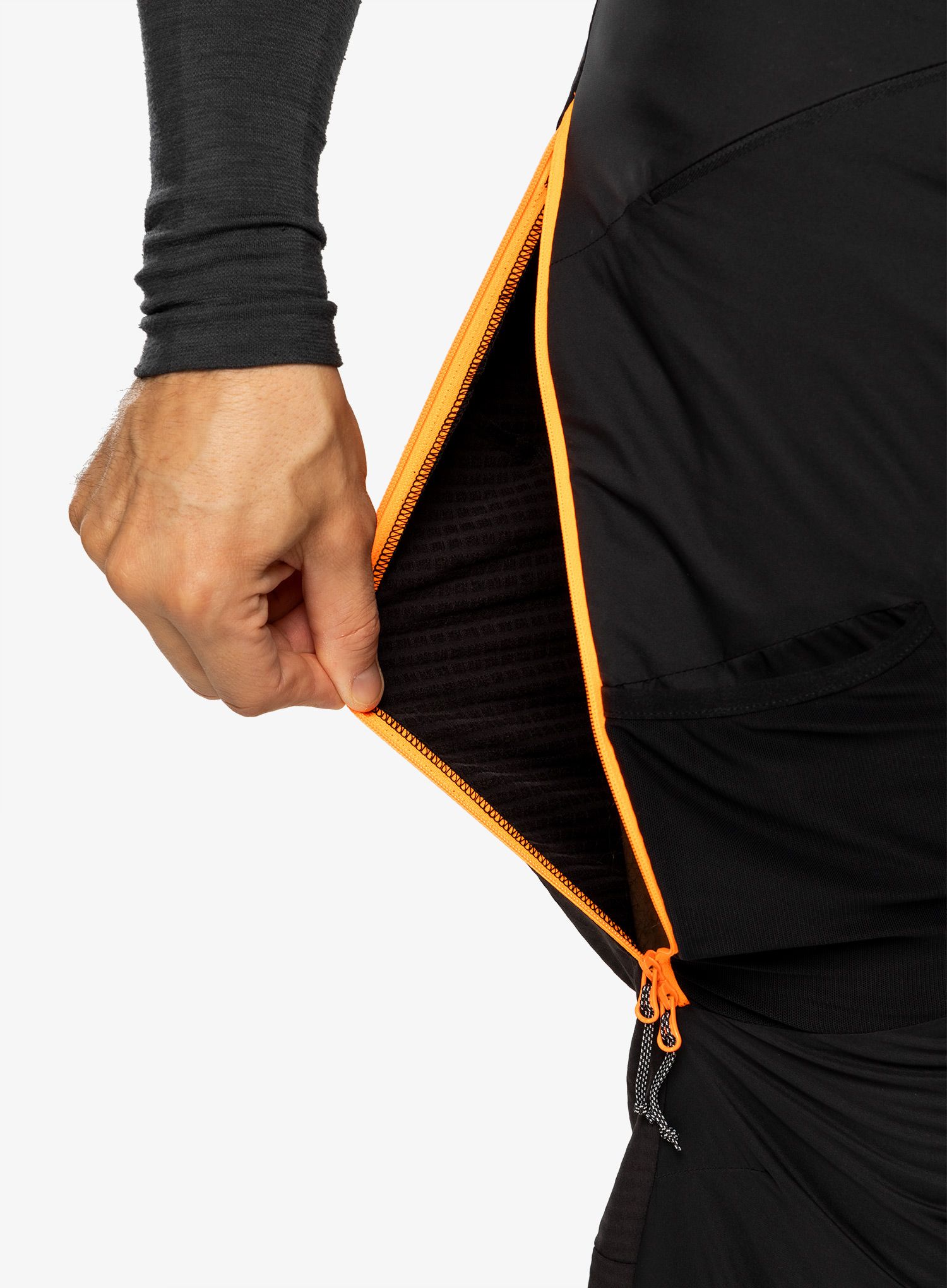 Zateplené kalhoty Mammut Aenergy IN Hybrid Pants - black/vibrant orange