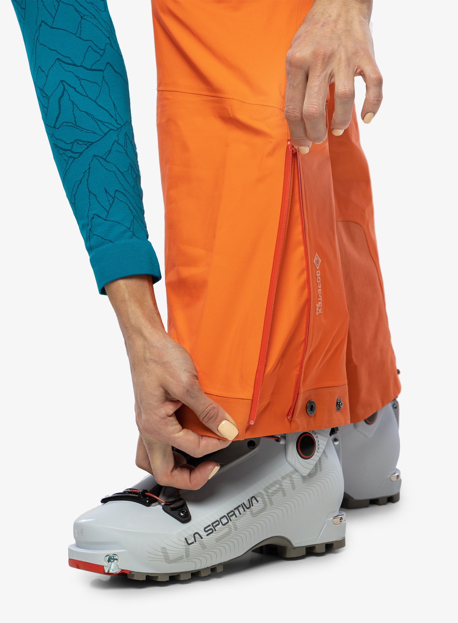 Kalhoty dámské Norrona Lyngen Gore-Tex Pro Pants - orange alert/peach amber