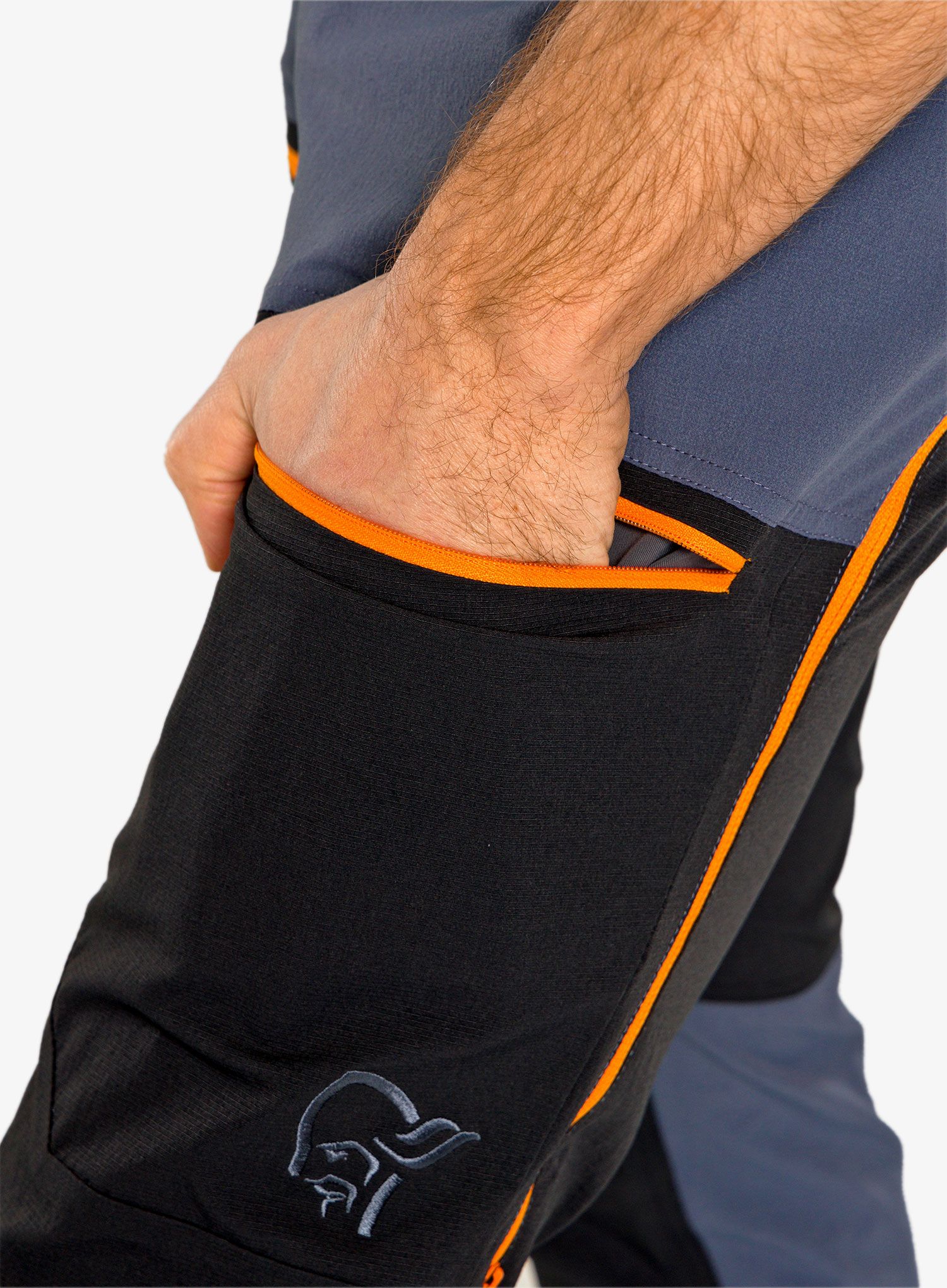 Softshell kalhoty Norrona Trollveggen Flex1 Pants - black/orange popsicle
