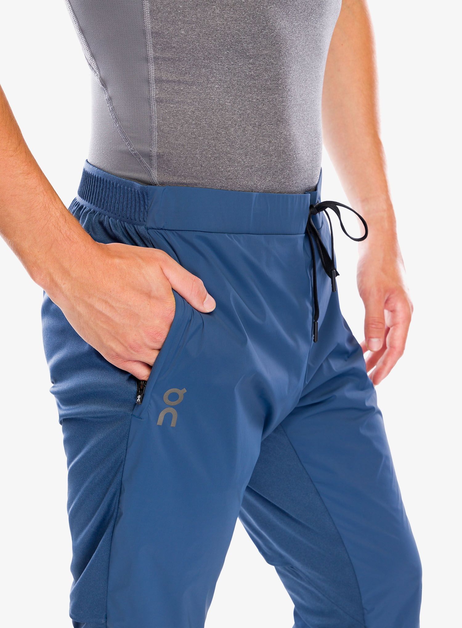 Běžecké kalhoty On Weather Pants - denim/navy