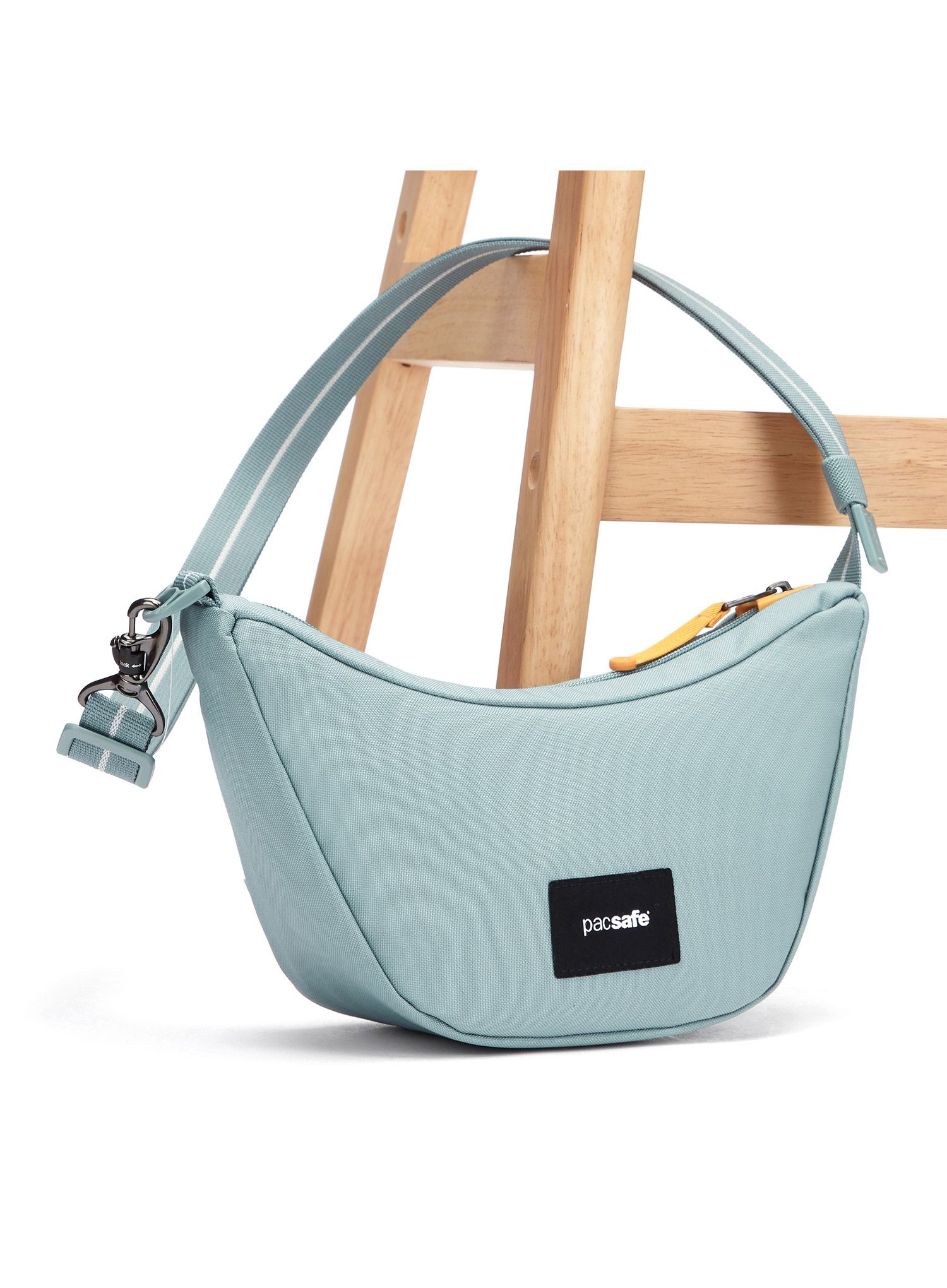 Kapsička na krk Pacsafe Go Lunar Crossbody - fresh mint
