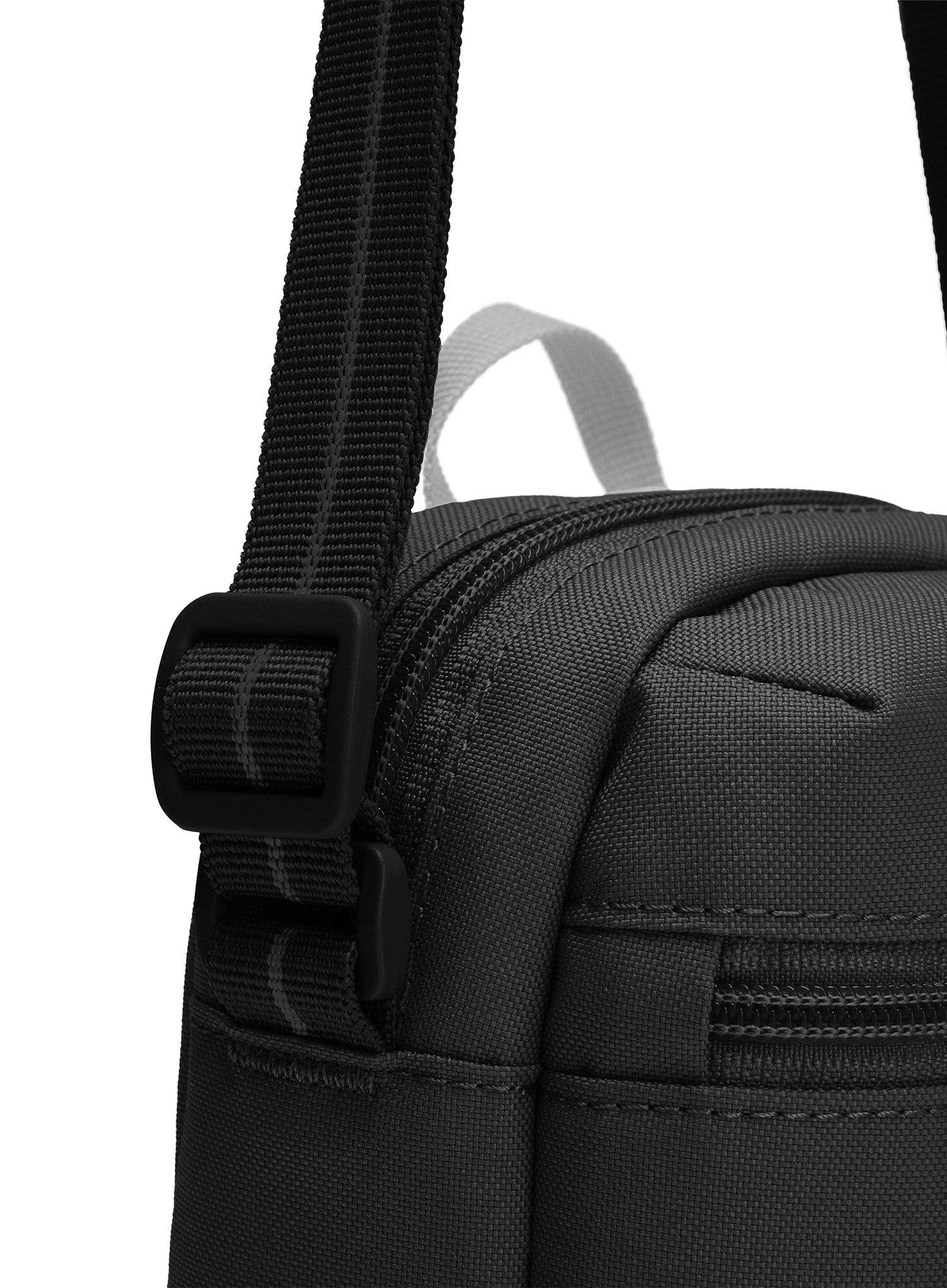 Kapsička na krk Pacsafe Go Micro Crossbody - jet black