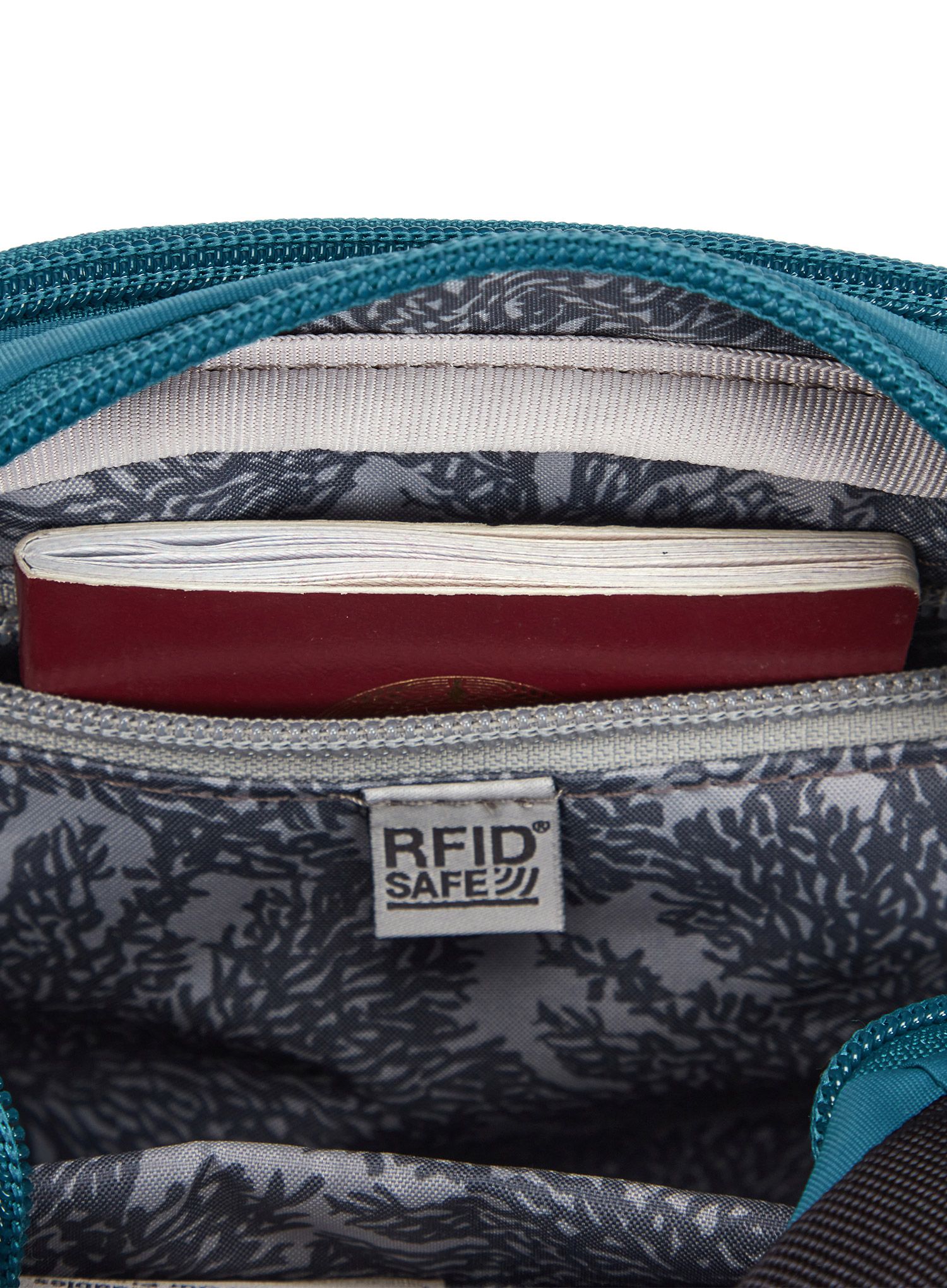 Kapsička na krk Pacsafe LS100 Crossbody - tidal teal