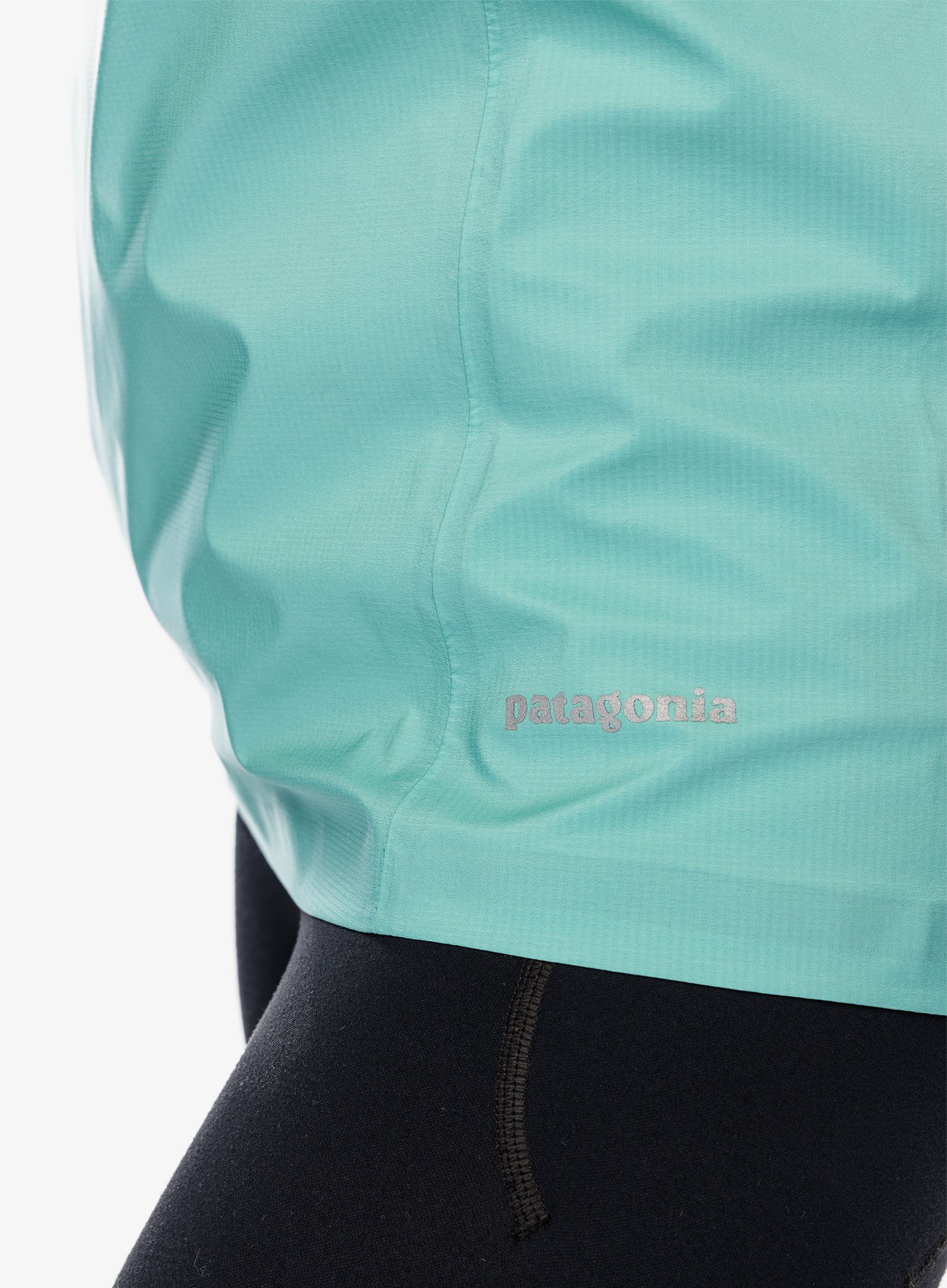 Dámská běžecká bunda Patagonia Storm Racer Jacket - fresh teal