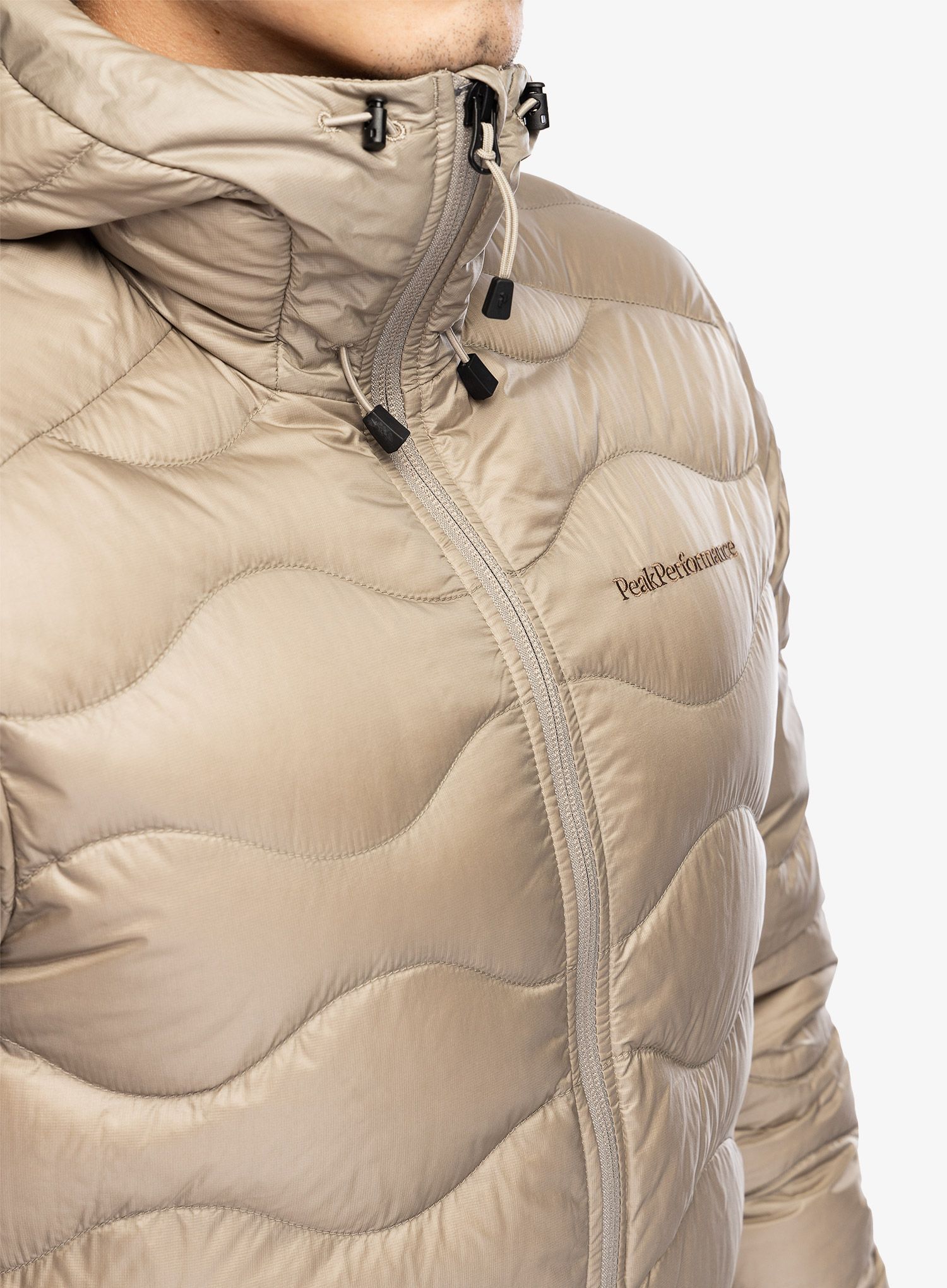 Péřová bunda Peak Performance Helium Down Hood Jacket - avid beige