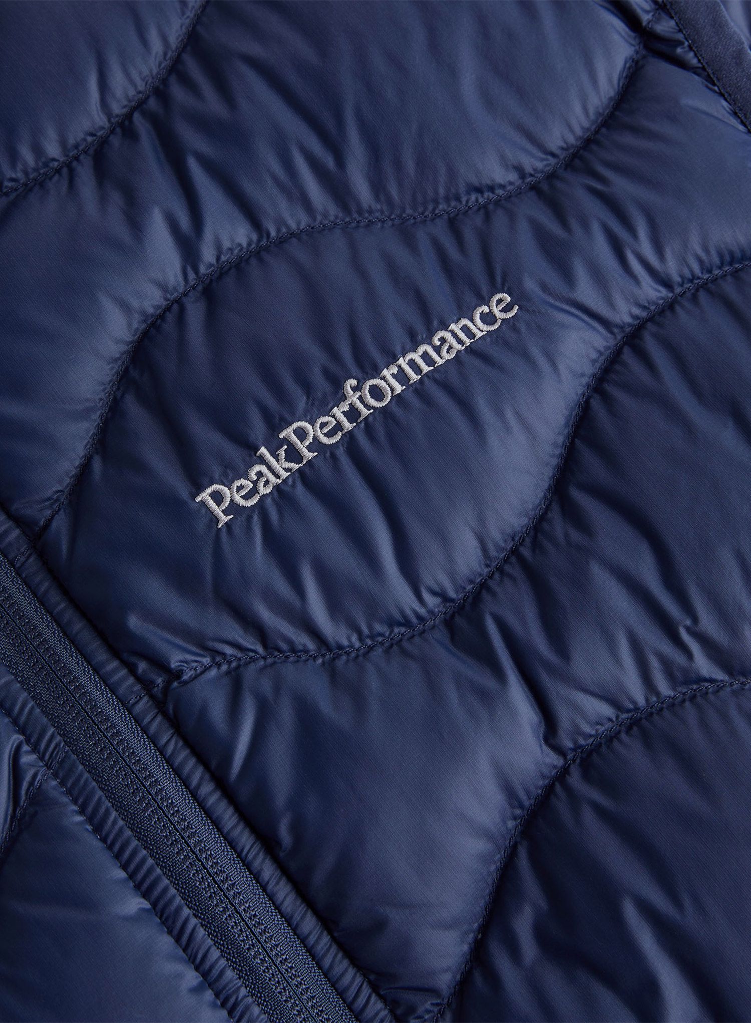 Péřová vesta Peak Performance Helium Down Vest - blue shadow