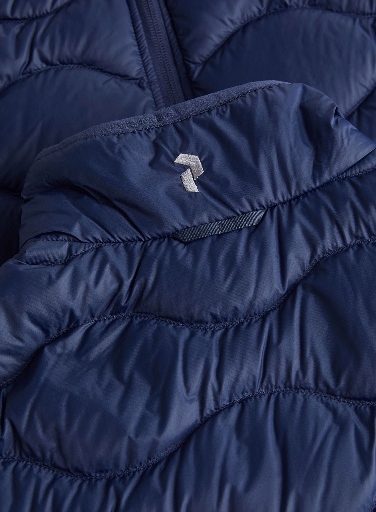 Péřová vesta Peak Performance Helium Down Vest - blue shadow