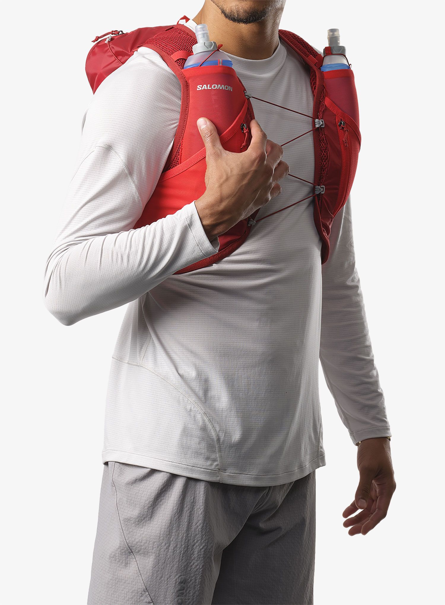 Běžecká vesta Salomon Active Skin 12 No Flasks - red dahlia/high risk