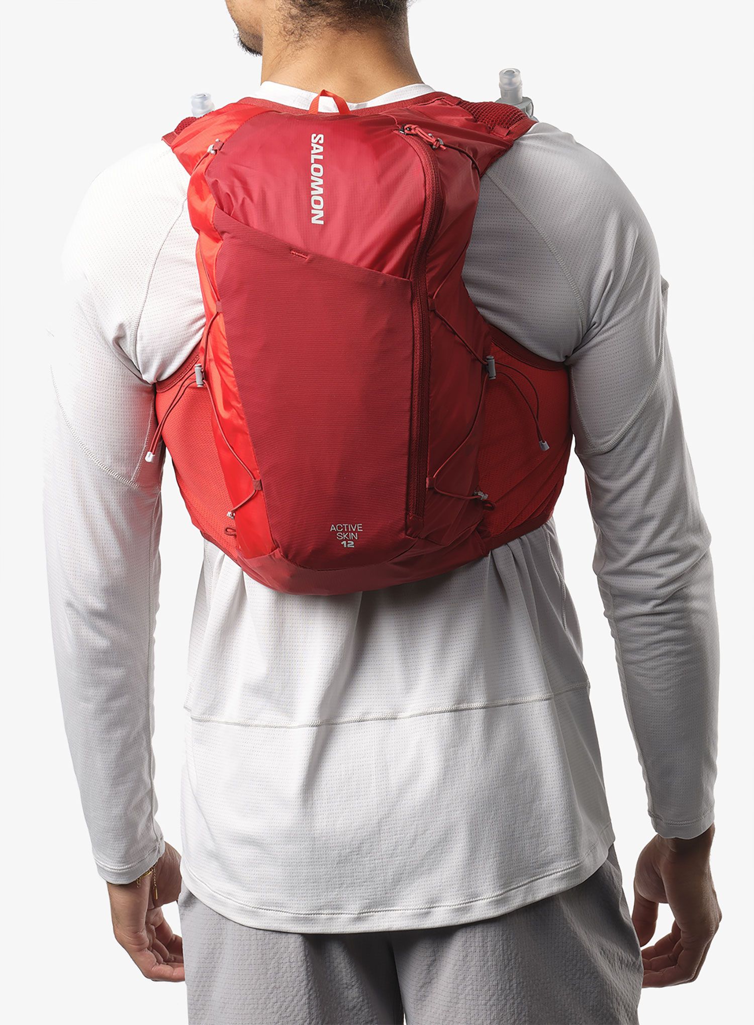 Běžecká vesta Salomon Active Skin 12 No Flasks - red dahlia/high risk