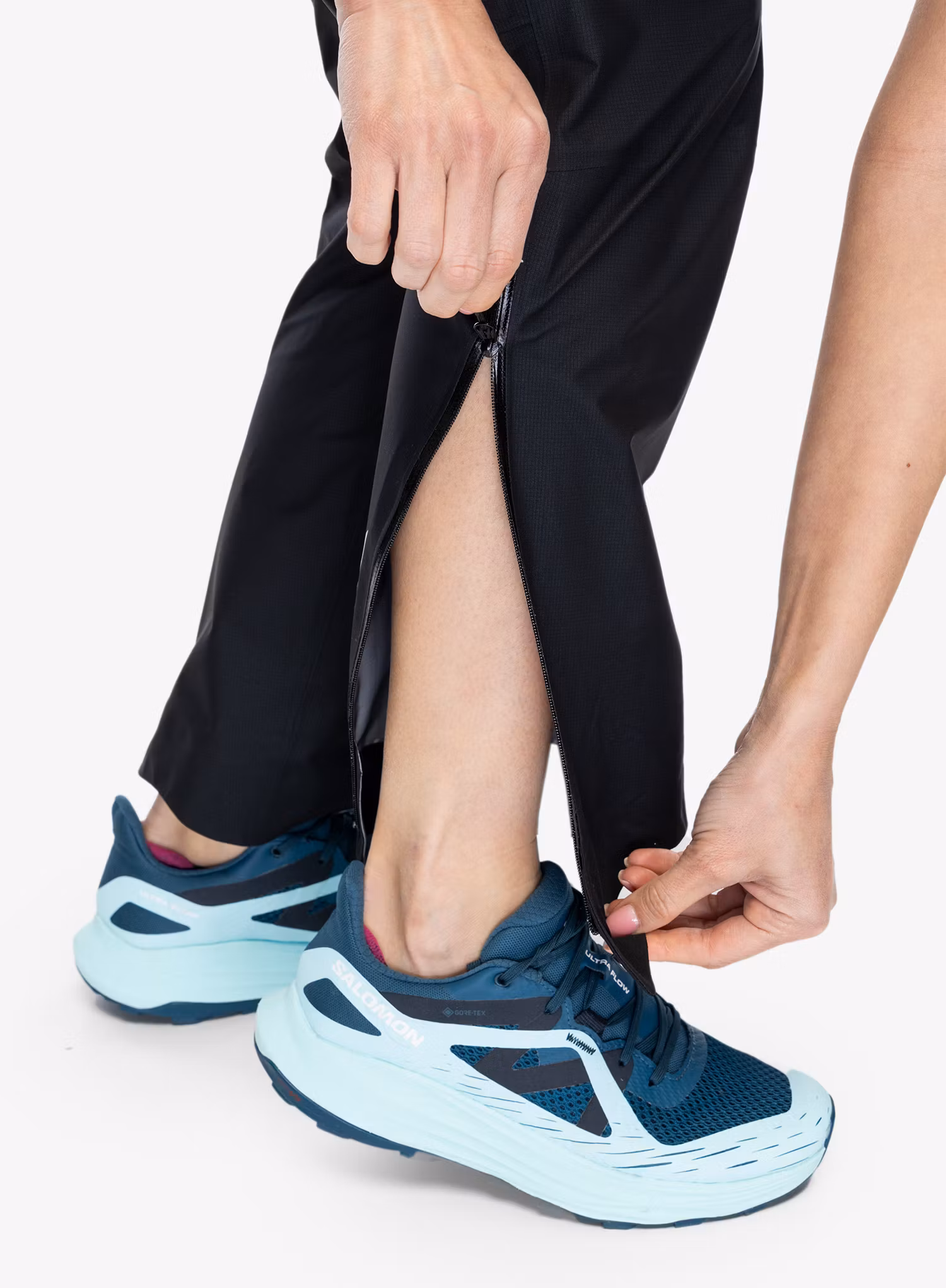 Běžecké kalhoty dámské Arcteryx Norvan Shell Pant - black