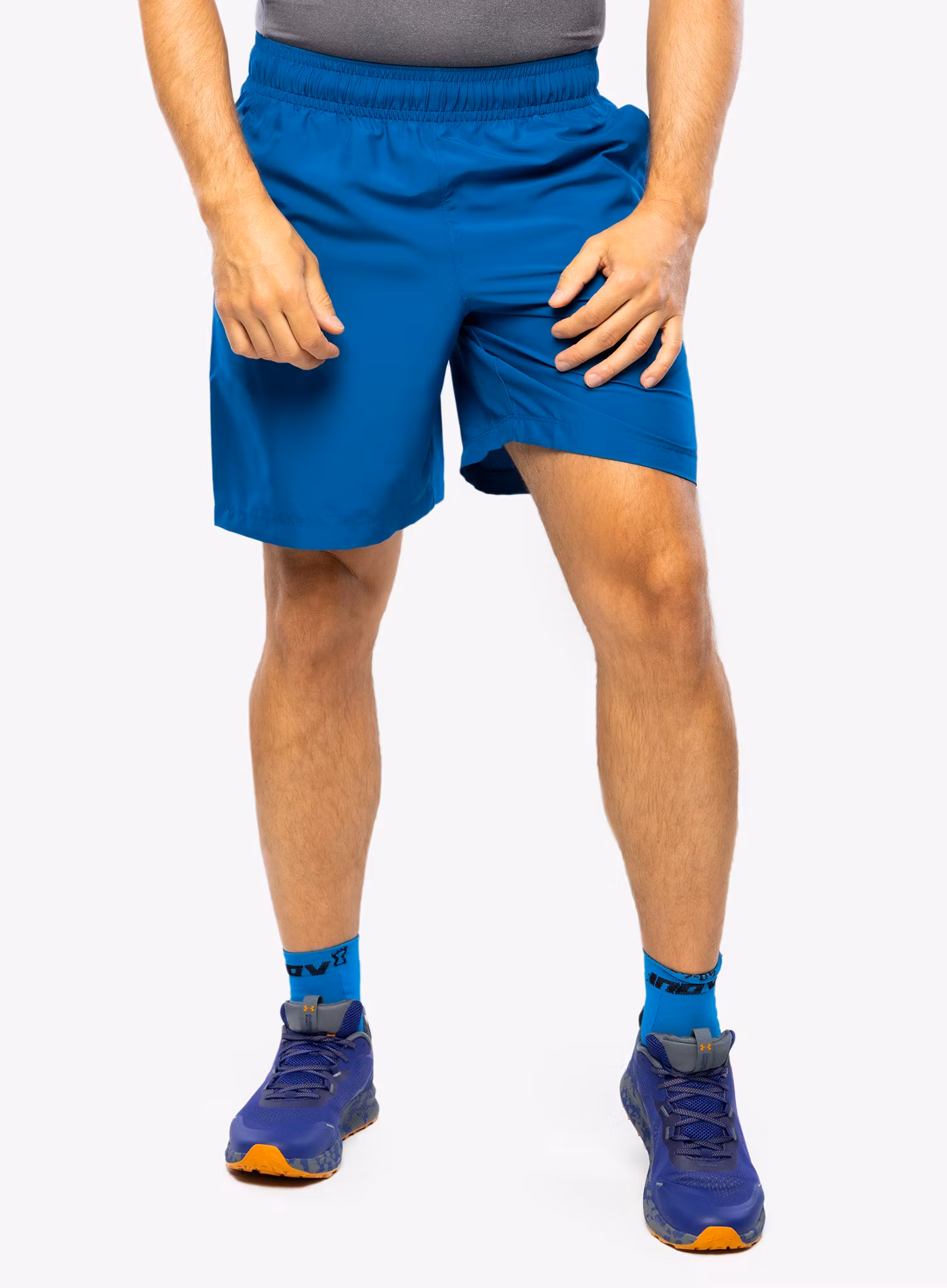 Kraťasy na cvičení Under Armour Woven Graphic Shorts - varsity blue/blizzard