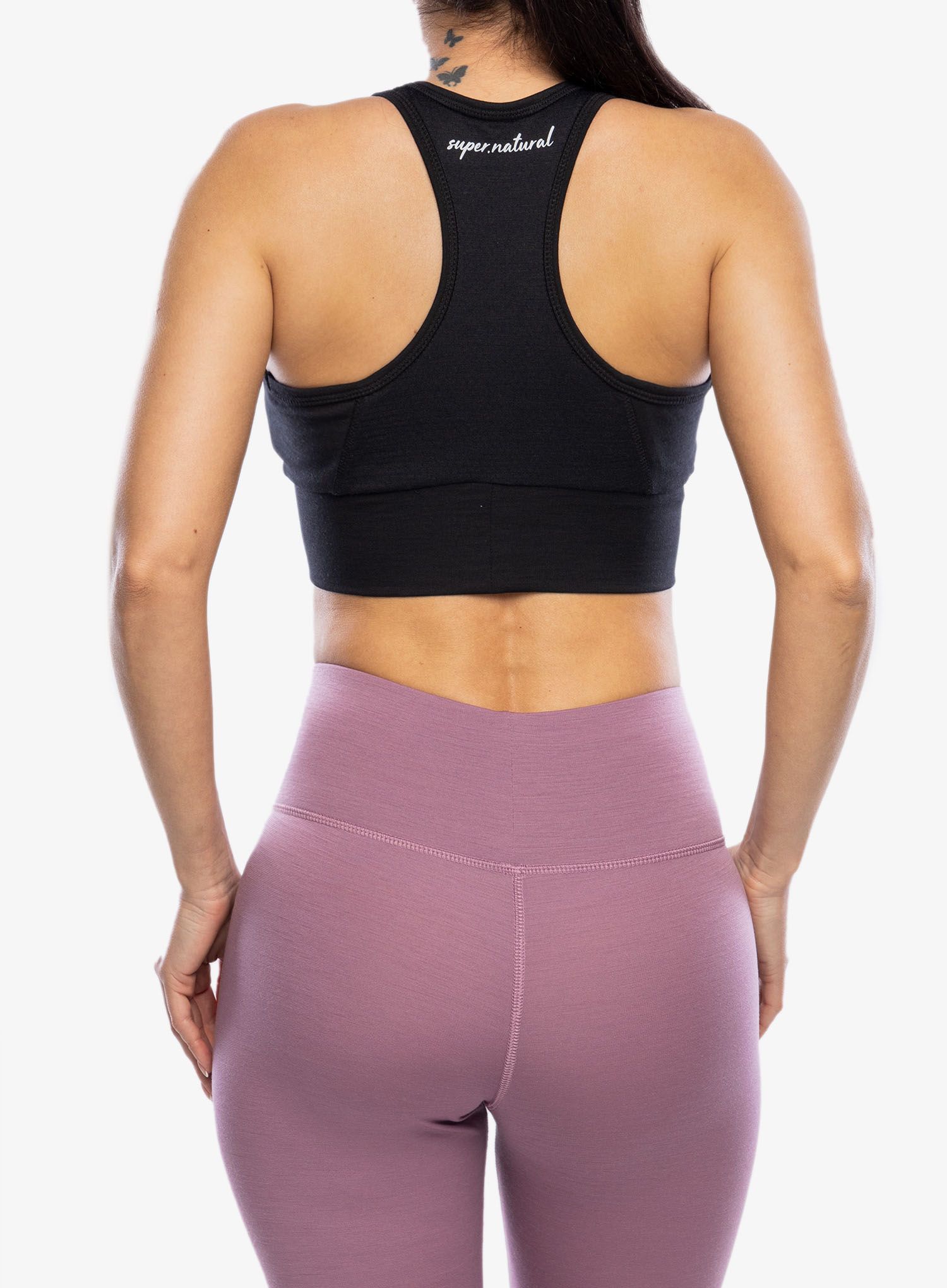 Sportovní podprsenka Super.natural Motion Zip Top - jet black